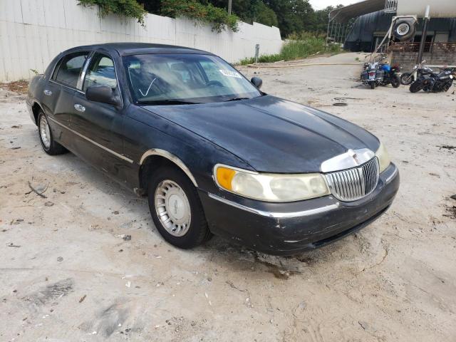 LINCOLN TOWN CAR E 2001 with VIN 1LNHM81W71Y710598 - Photo from auction