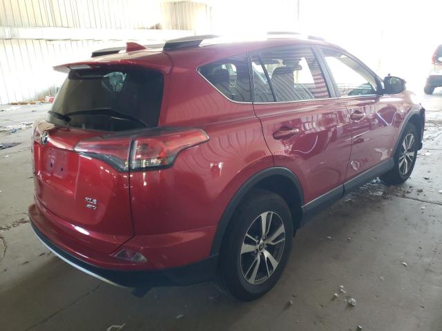 Photo 4 from auction – 2016 TOYOTA RAV4 XLE with VIN JTMRFREV7GJ095658