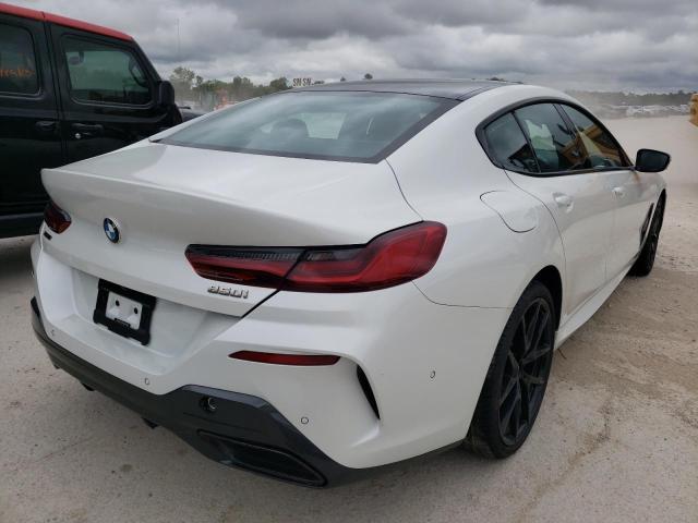 Photo 4 from auction – 2022 BMW M850XI with VIN WBAGV8C08NCH43652