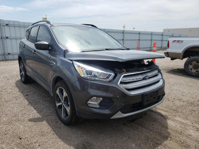 FORD ESCAPE SEL 2018 with VIN 1FMCU9HD1JUC70227 - Photo from auction