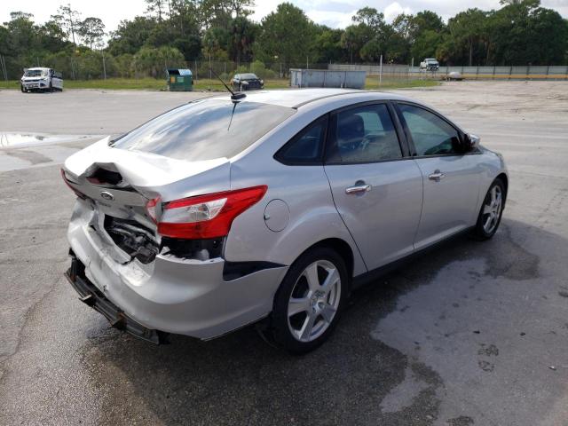 Photo 4 from auction – 2013 FORD FOCUS S with VIN 1FADP3E26DL323049