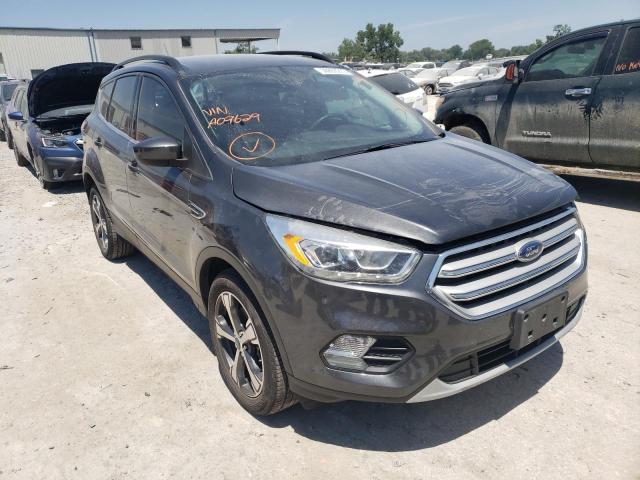 FORD ESCAPE SEL 2018 with VIN 1FMCU9HDXJUA09629 - Photo from auction