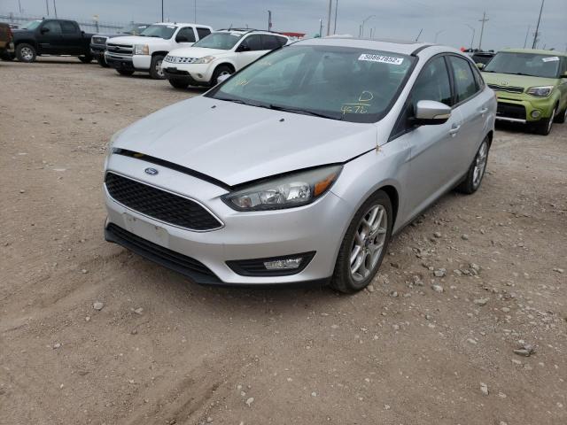 Photo 2 from auction – 2015 FORD FOCUS SE with VIN 1FADP3F28FL264572