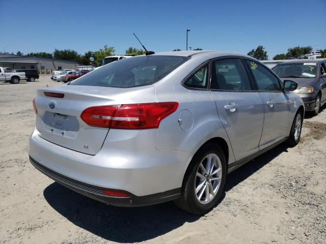 Photo 4 from auction – 2015 FORD FOCUS SE with VIN 1FADP3F22FL256838