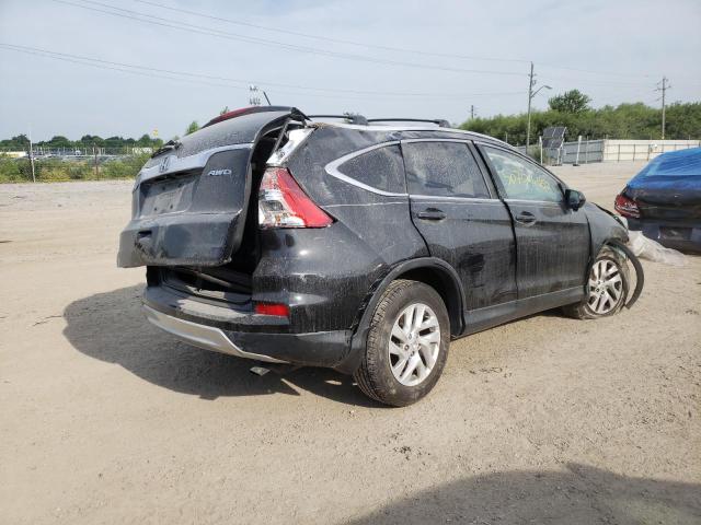 Photo 4 from auction – 2016 HONDA CR-V EXL with VIN 2HKRM4H74GH640195