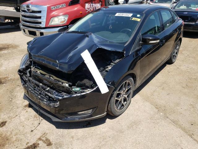 Photo 2 from auction – 2018 FORD FOCUS SEL with VIN 1FADP3H29JL268295