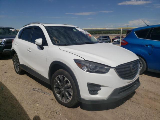 MAZDA CX-5 GT 2016 with VIN JM3KE4DY0G0772002 - Photo from auction