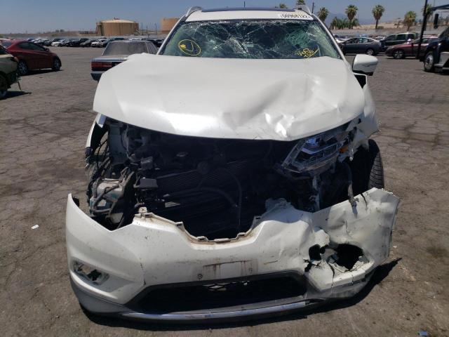 Photo 9 from auction – 2015 NISSAN ROGUE S with VIN 5N1AT2MVXFC790505