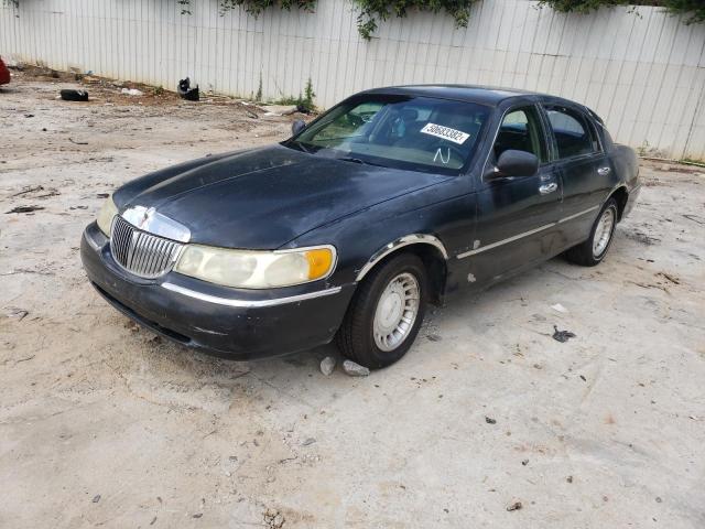 Photo 2 from auction – 2001 LINCOLN TOWN CAR E with VIN 1LNHM81W71Y710598