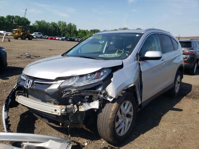 Photo 2 from auction – 2015 HONDA CR-V EXL with VIN 2HKRM4H71FH677946