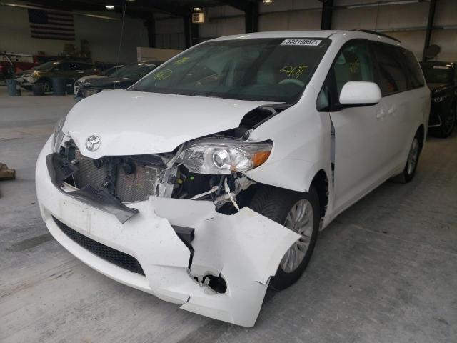 Photo 2 from auction – 2014 TOYOTA SIENNA XLE with VIN 5TDYK3DC6ES463509