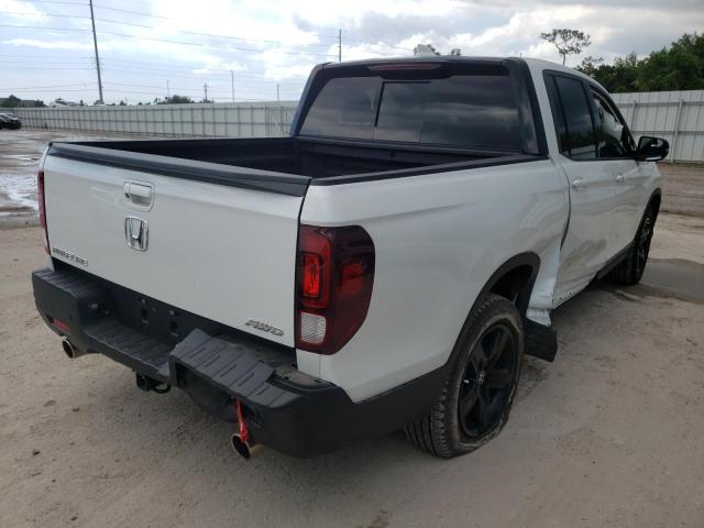 Photo 4 from auction – 2021 HONDA RIDGELINE with VIN 5FPYK3F89MB001609