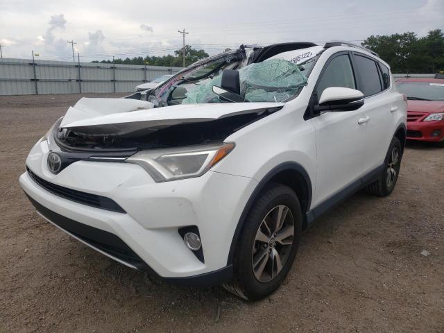 Photo 2 from auction – 2017 TOYOTA RAV4 XLE with VIN JTMWFREV6HJ129643