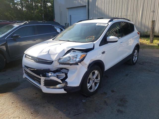 Photo 2 from auction – 2016 FORD ESCAPE SE with VIN 1FMCU9GX2GUB17375