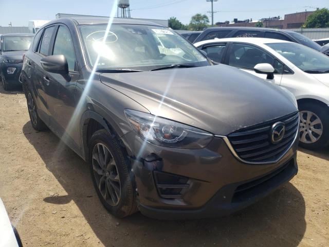 MAZDA CX-5 GT 2016 with VIN JM3KE4DY1G0704338 - Photo from auction