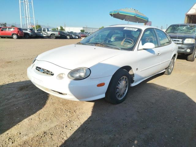 Photo 2 from auction – 1999 FORD TAURUS SE with VIN 1FAFP53S9XG308839