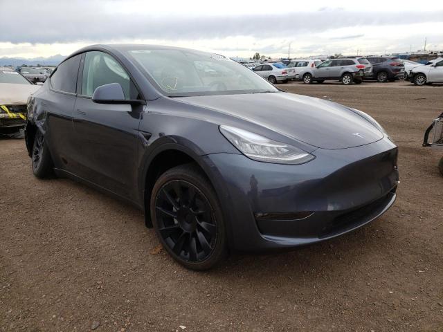 TESLA MODEL Y 2022 with VIN 7SAYGDEE2NF422826 - Photo from auction