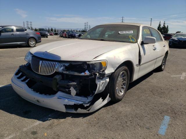 Photo 2 from auction – 2000 LINCOLN TOWN CAR S with VIN 1LNHM82W3YY906644