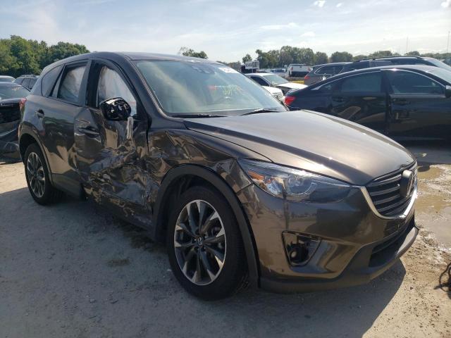 MAZDA CX-5 GT 2016 with VIN JM3KE2DY5G0665239 - Photo from auction