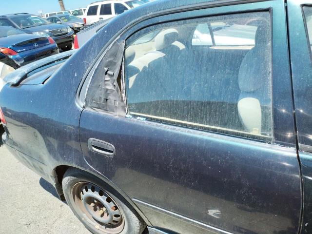 Photo 9 from auction – 1999 TOYOTA COROLLA with VIN 1NXBR12E0XZ276500