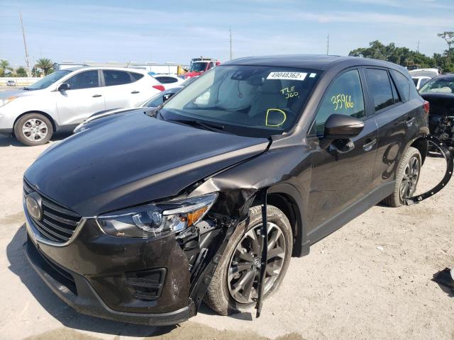 Photo 2 from auction – 2016 MAZDA CX-5 GT with VIN JM3KE2DY5G0665239