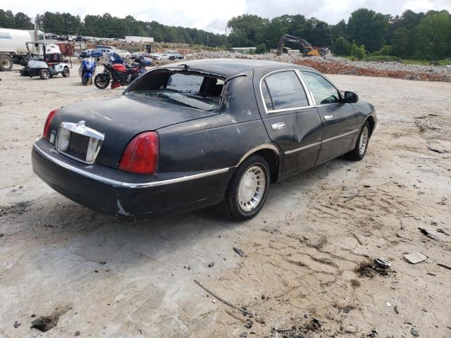 Photo 4 from auction – 2001 LINCOLN TOWN CAR E with VIN 1LNHM81W71Y710598