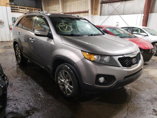 KIA SORENTO EX 2011 with VIN 5XYKUDA25BG114142 - Photo from auction