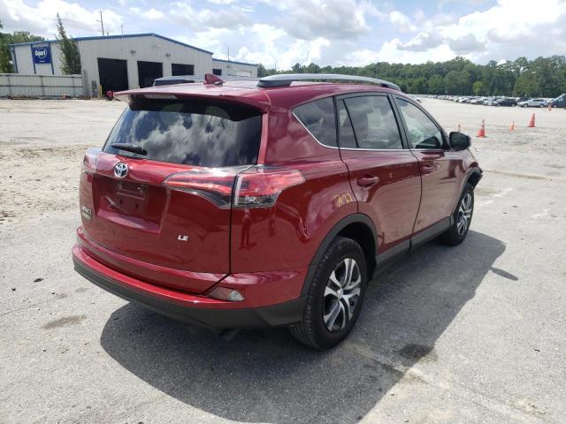 Photo 4 from auction – 2018 TOYOTA RAV4 LE with VIN 2T3ZFREVXJW513526