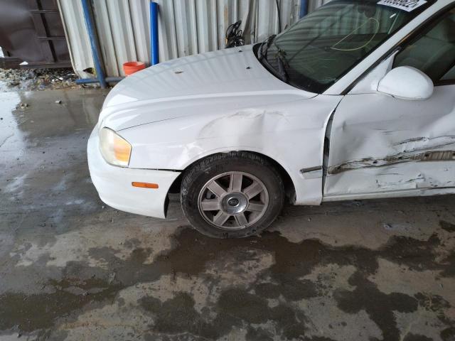 Photo 10 from auction – 2003 KIA OPTIMA LX with VIN KNAGD128335251014