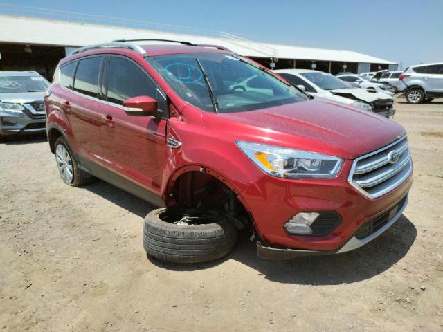 FORD ESCAPE TIT 2018 with VIN 1FMCU0J99JUD29803 - Photo from auction