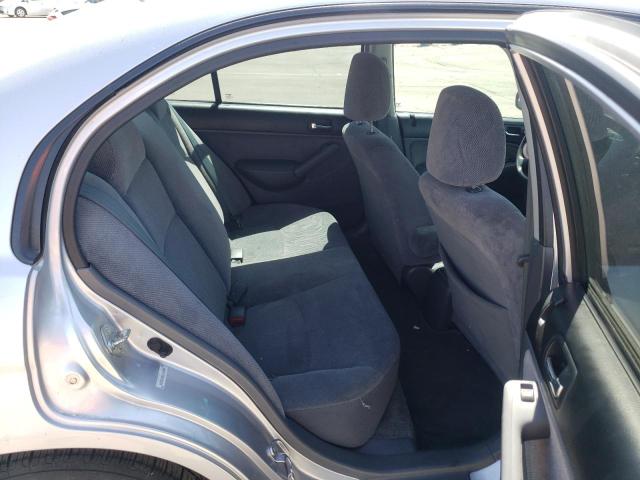 Photo 6 from auction – 2002 HONDA CIVIC LX with VIN 1HGES16552L049156