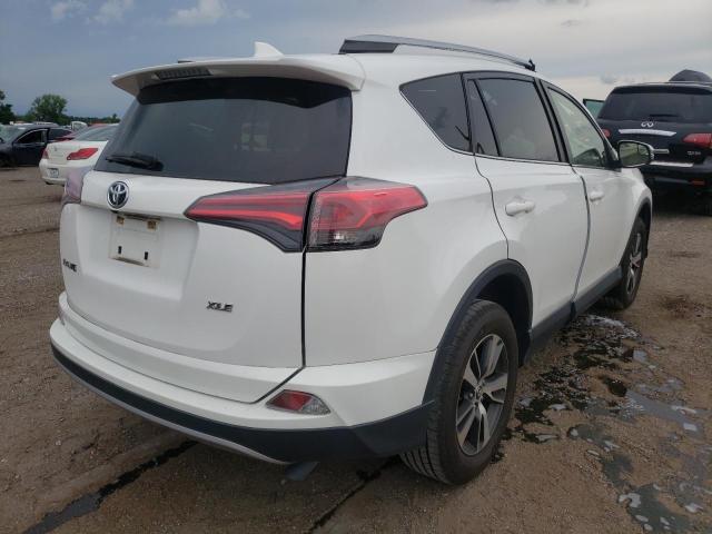 Photo 4 from auction – 2017 TOYOTA RAV4 XLE with VIN JTMWFREV6HJ129643