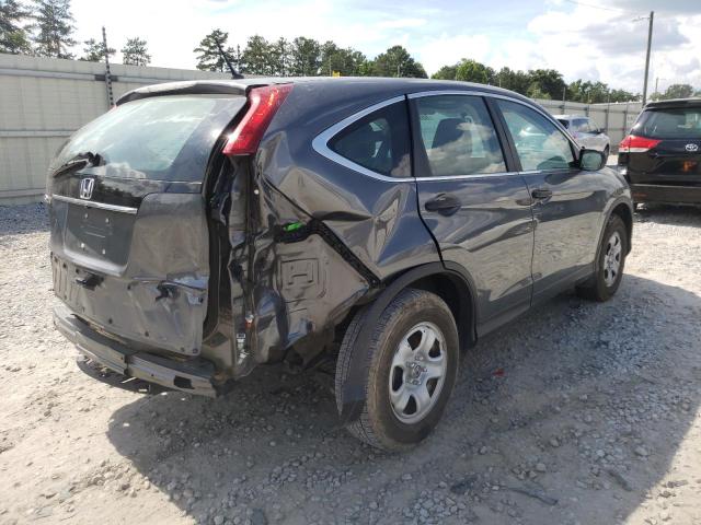 Photo 4 from auction – 2014 HONDA CR-V LX with VIN 2HKRM3H32EH506239