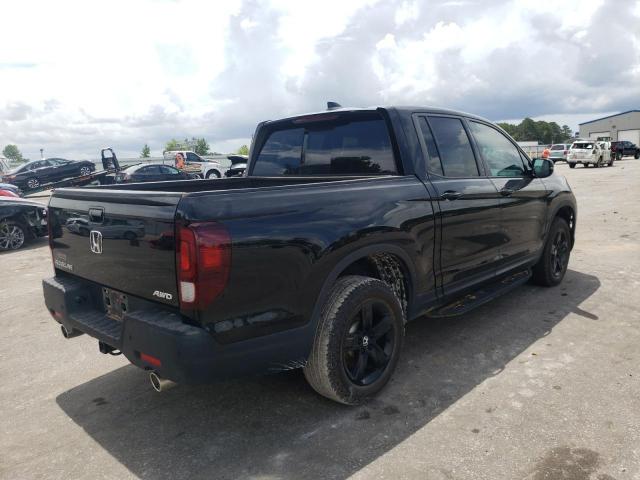 Photo 4 from auction – 2021 HONDA RIDGELINE with VIN 5FPYK3F82MB003704