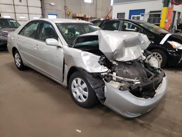 TOYOTA CAMRY LE 2003 with VIN 4T1BE30KX3U771491 - Photo from auction