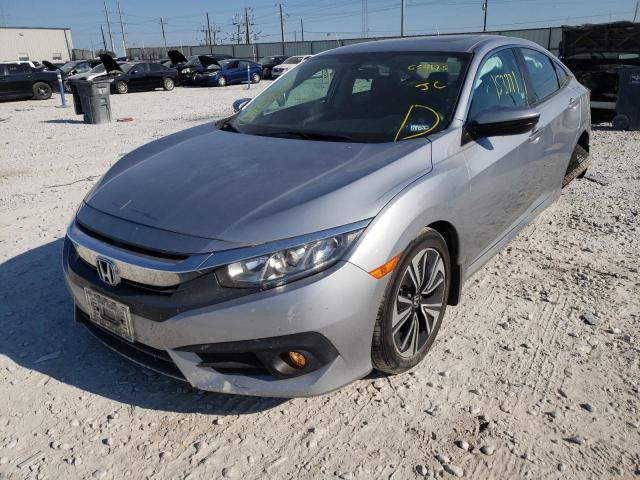 Photo 2 from auction – 2017 HONDA CIVIC EX with VIN 2HGFC1F32HH654175