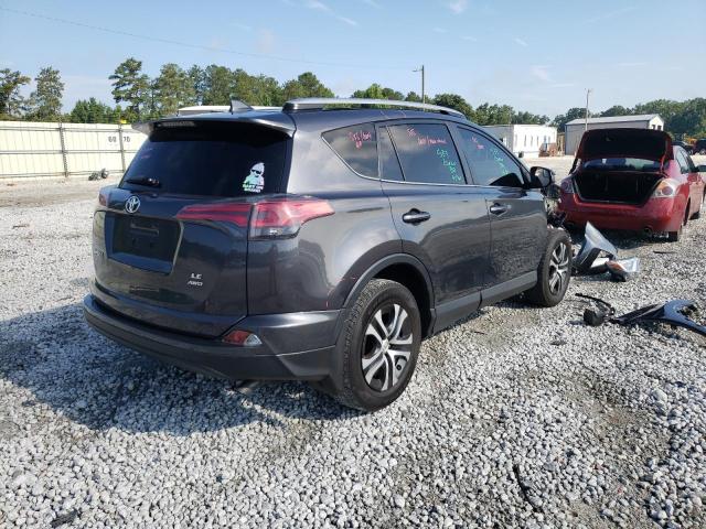 Photo 4 from auction – 2016 TOYOTA RAV4 LE with VIN JTMBFREV3GJ092287