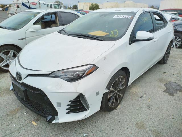 Photo 2 from auction – 2018 TOYOTA COROLLA L with VIN 2T1BURHE0JC091084