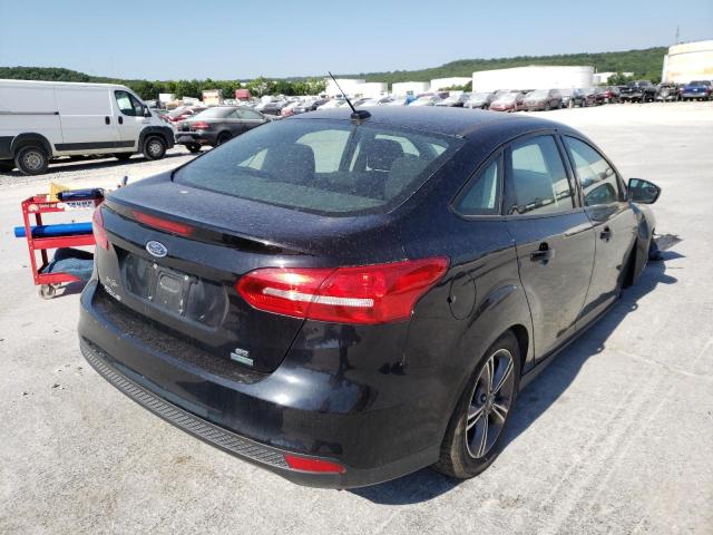 Photo 4 from auction – 2018 FORD FOCUS SE with VIN 1FADP3FE4JL265673