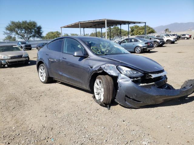 TESLA MODEL Y 2022 with VIN 7SAYGDEE0NF343932 - Photo from auction