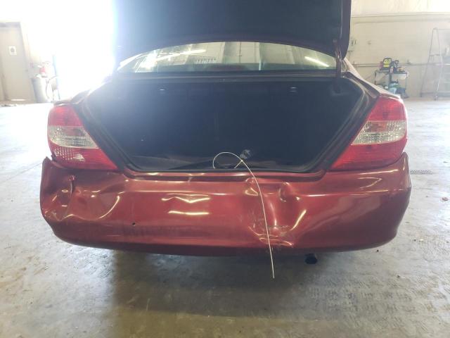 Photo 9 from auction – 2004 TOYOTA CAMRY LE with VIN 4T1BE30KX4U371433