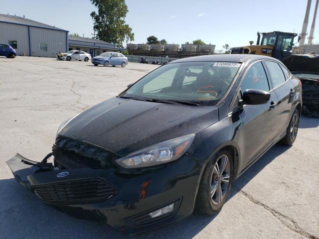 Photo 2 from auction – 2018 FORD FOCUS SE with VIN 1FADP3FE4JL265673