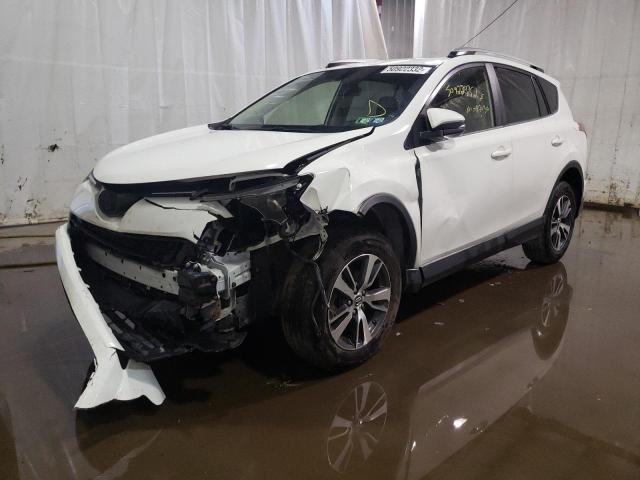 Photo 2 from auction – 2016 TOYOTA RAV4 XLE with VIN JTMRFREV4GJ085993