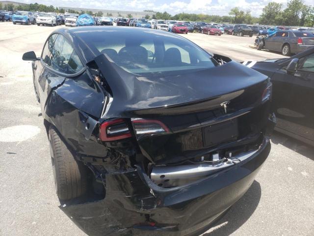 Photo 3 from auction – 2021 TESLA MODEL 3 with VIN 5YJ3E1EA5MF087505