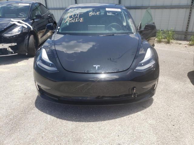 Photo 7 from auction – 2021 TESLA MODEL 3 with VIN 5YJ3E1EA5MF087505