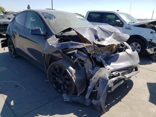 TESLA MODEL Y 2020 with VIN 5YJYGDEE2LF008438 - Photo from auction