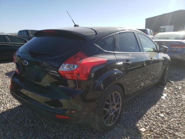 Photo 4 from auction – 2014 FORD FOCUS SE with VIN 1FADP3K2XEL327241