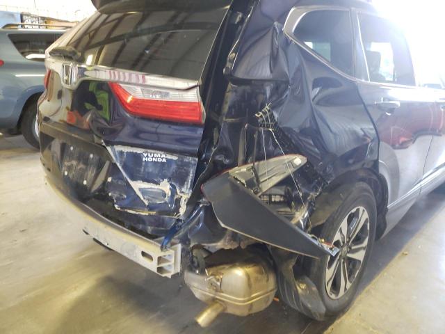 Photo 9 from auction – 2017 HONDA CR-V LX with VIN 7FARW5H36HE011930