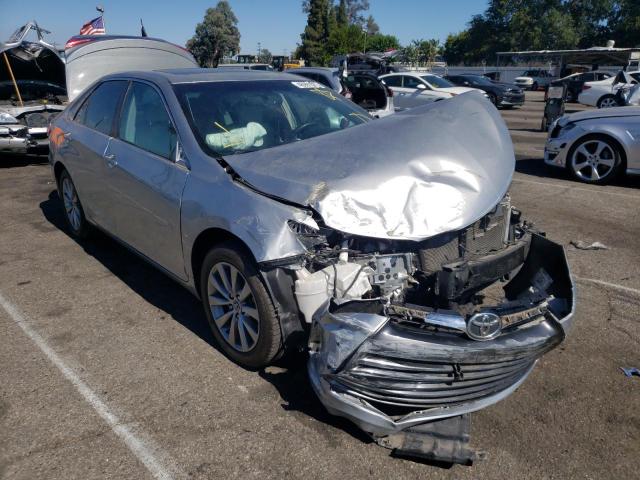 TOYOTA CAMRY LE 2015 with VIN 4T1BF1FKXFU948490 - Photo from auction
