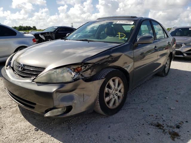 Photo 2 from auction – 2004 TOYOTA CAMRY LE with VIN 4T1BF32K44U581200